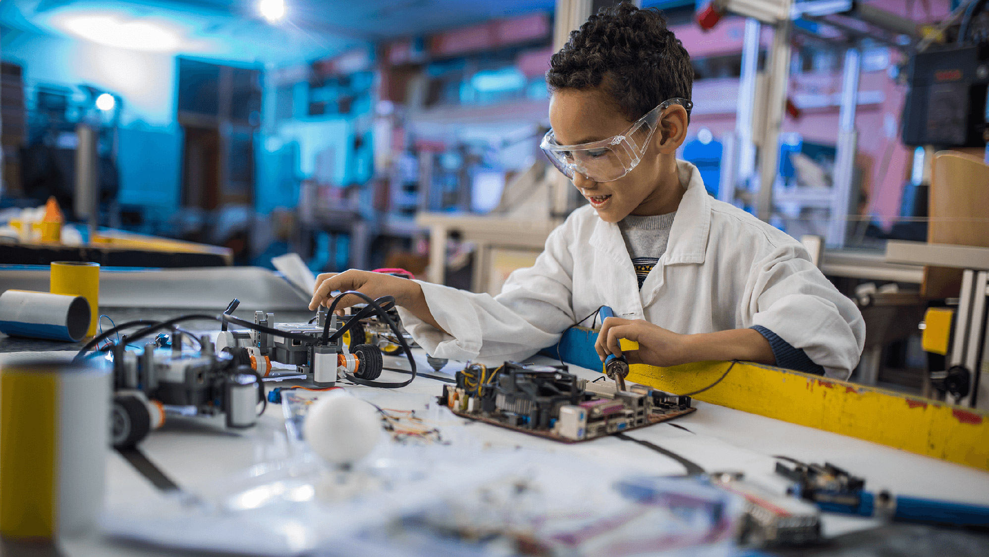 Young boy doing a science experiment.