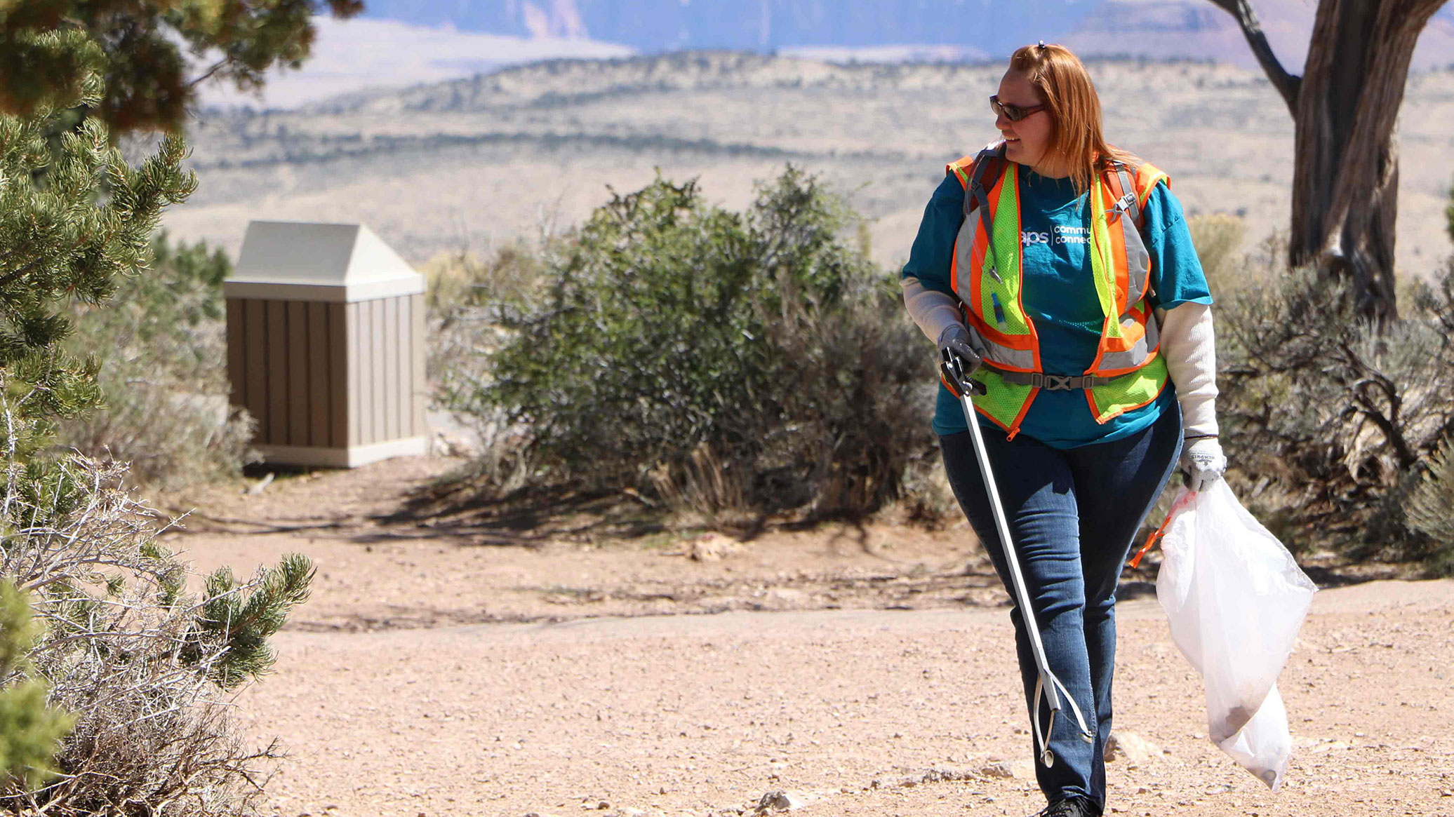 APS volunteering helping pick up litter.