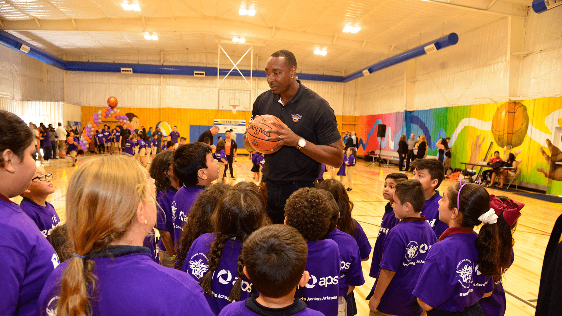 Children at a Phoenix Suns basketball camp.