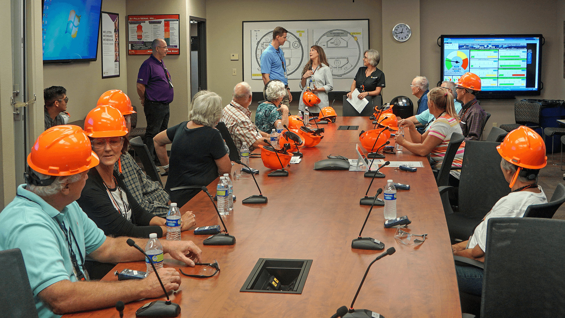 APS employees having a meeting.