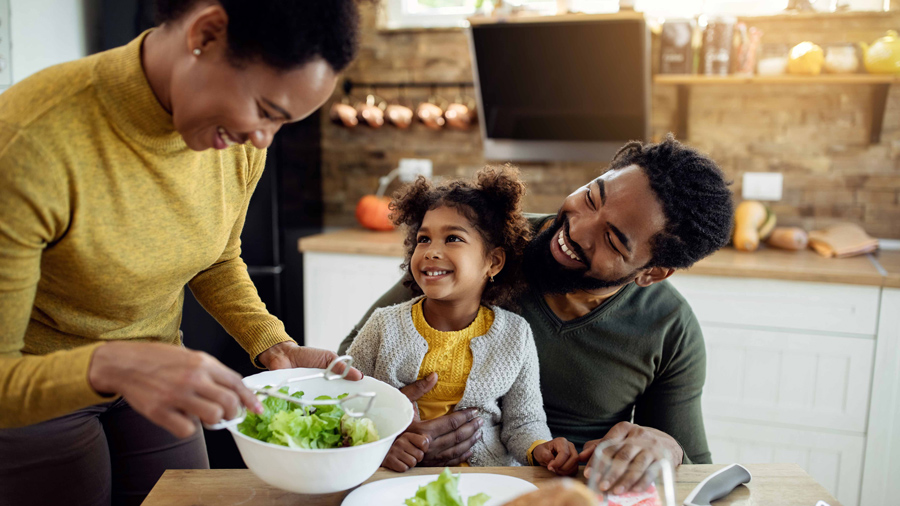 Family having a meal at a table.