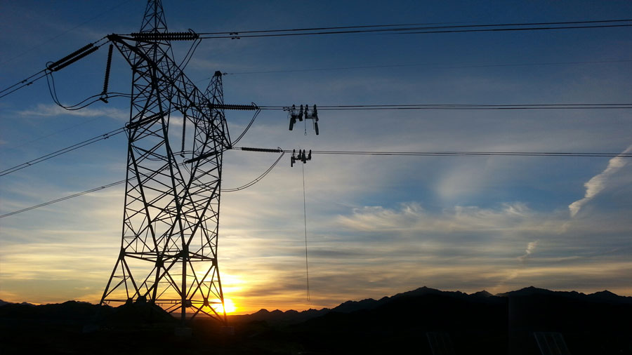 power lines agains a fading sunset