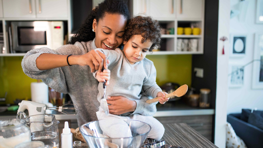 Mom cooking with child