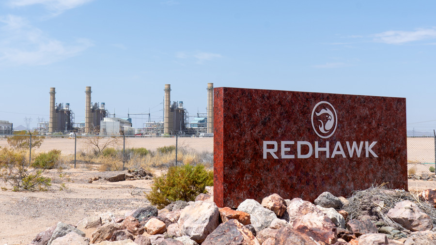 Redhawk sign in front of a power plant