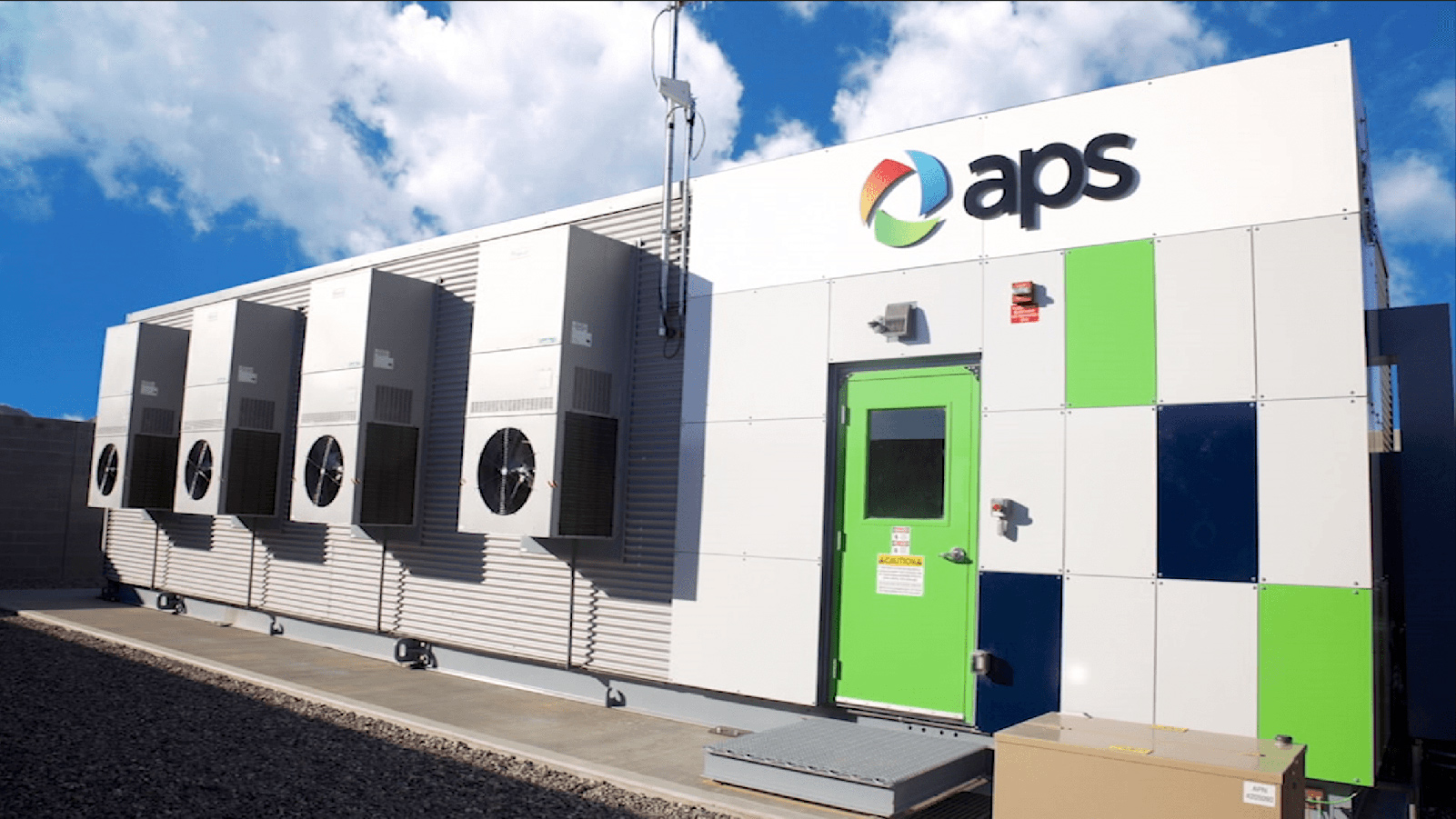 APS battery storage facility with a blue sky and clouds.