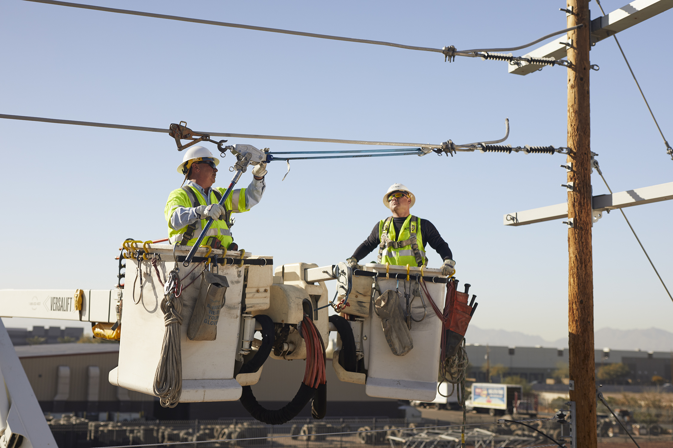 Linemen working in a bucket truck
