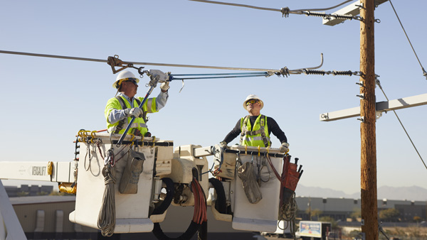 Linemen working in a bucket truck