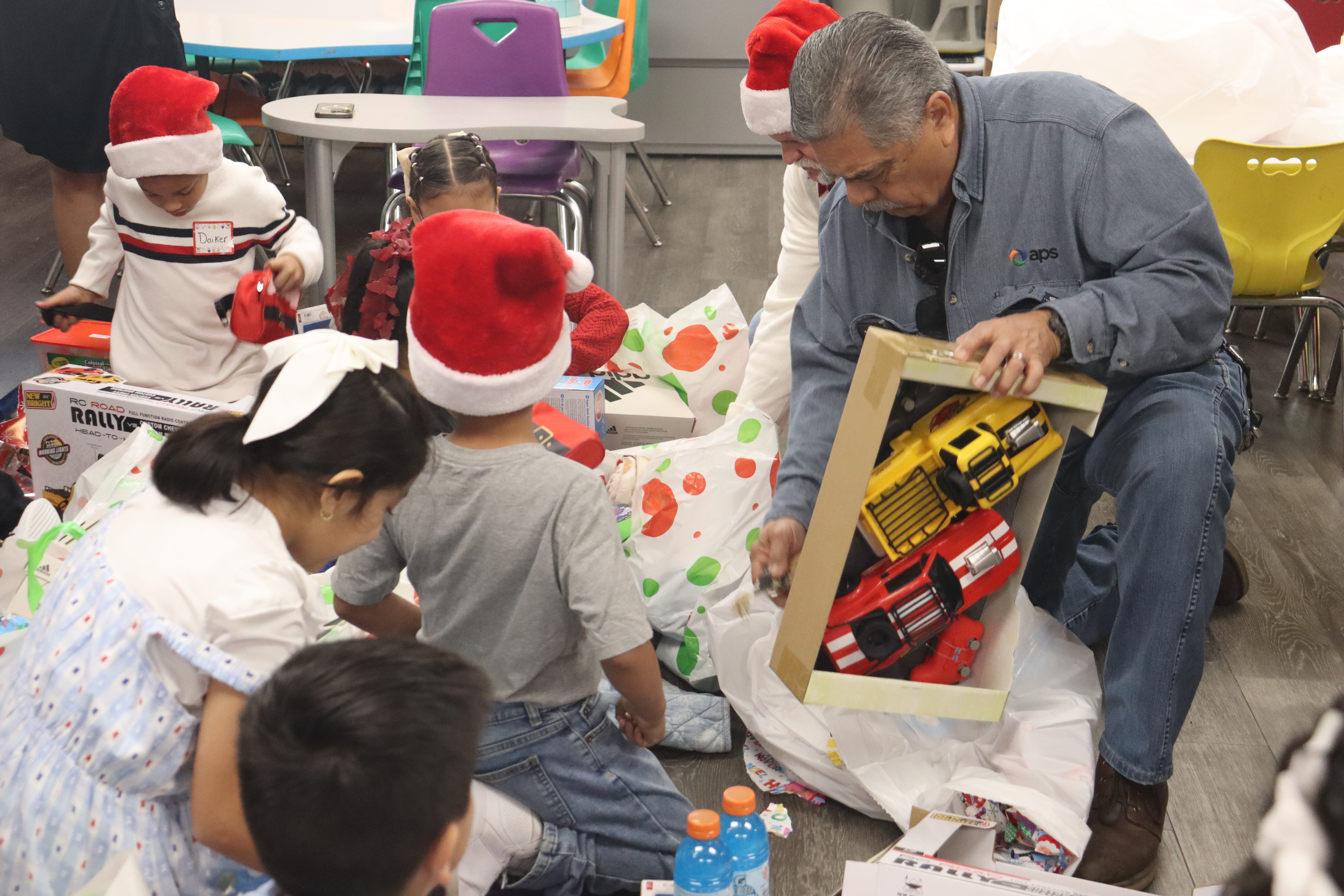APS employees deliver gifts to WIlson Primary Students