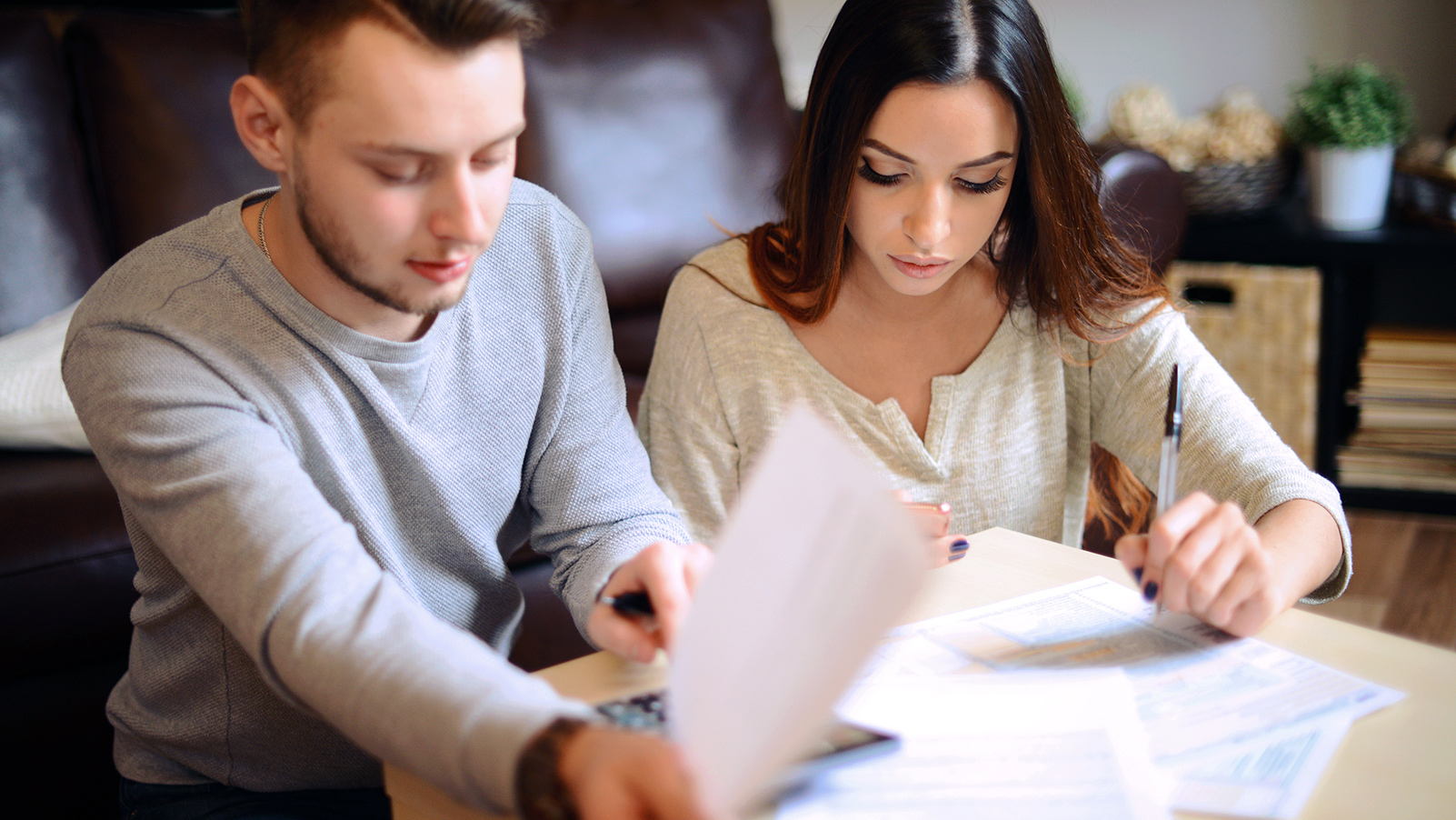 Couple reviewing important documents.
