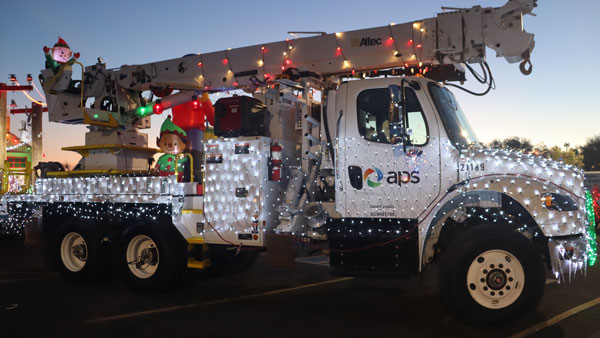 Boom truck with holiday lights on it