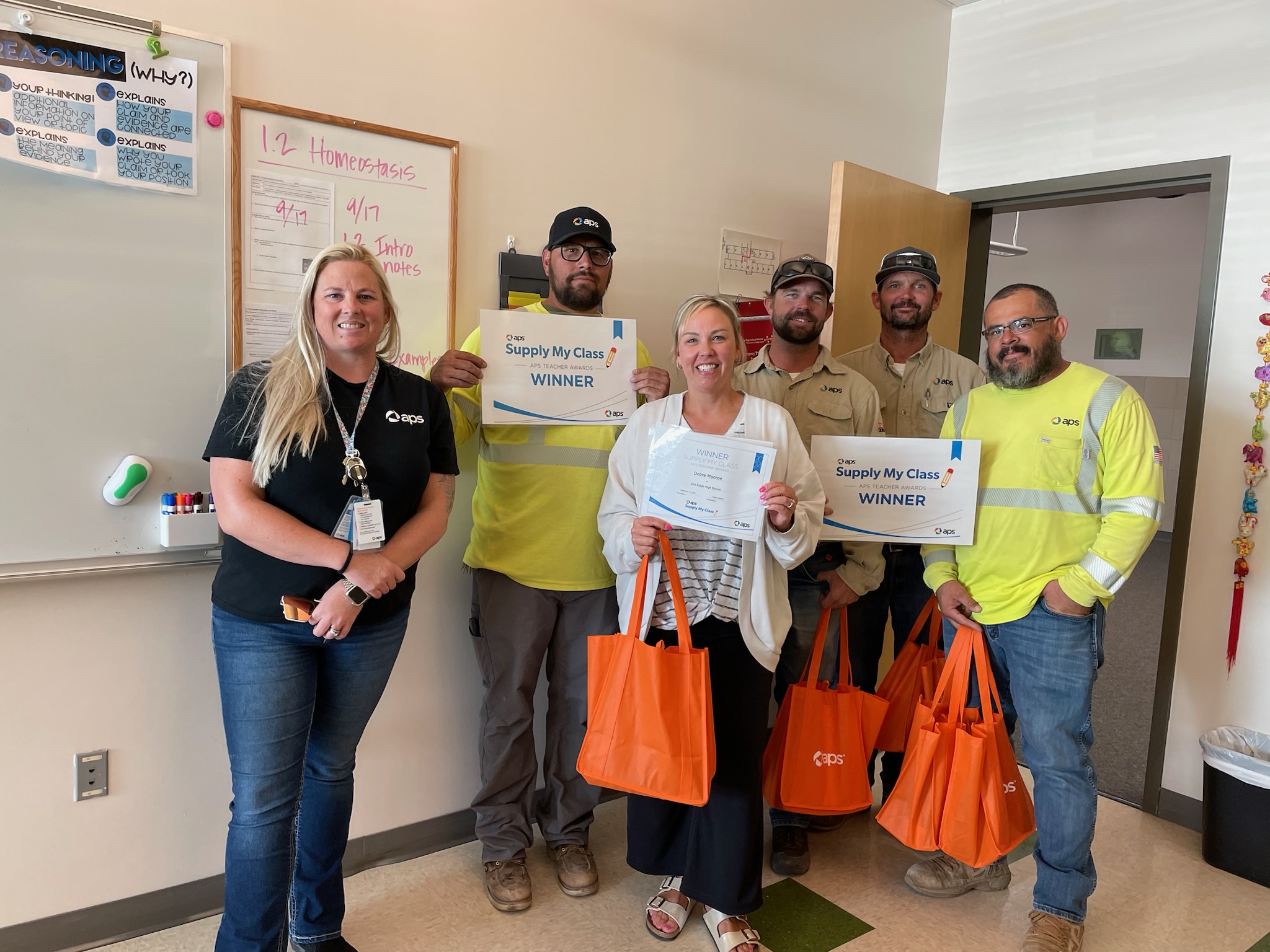  APS Materials and Services Coordinator Shannon Olson and an APS Yuma crew surprised teachers at Gila Ridge High School in Yuma.