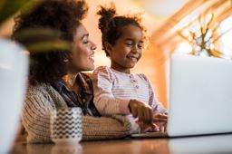 mom girl laptop