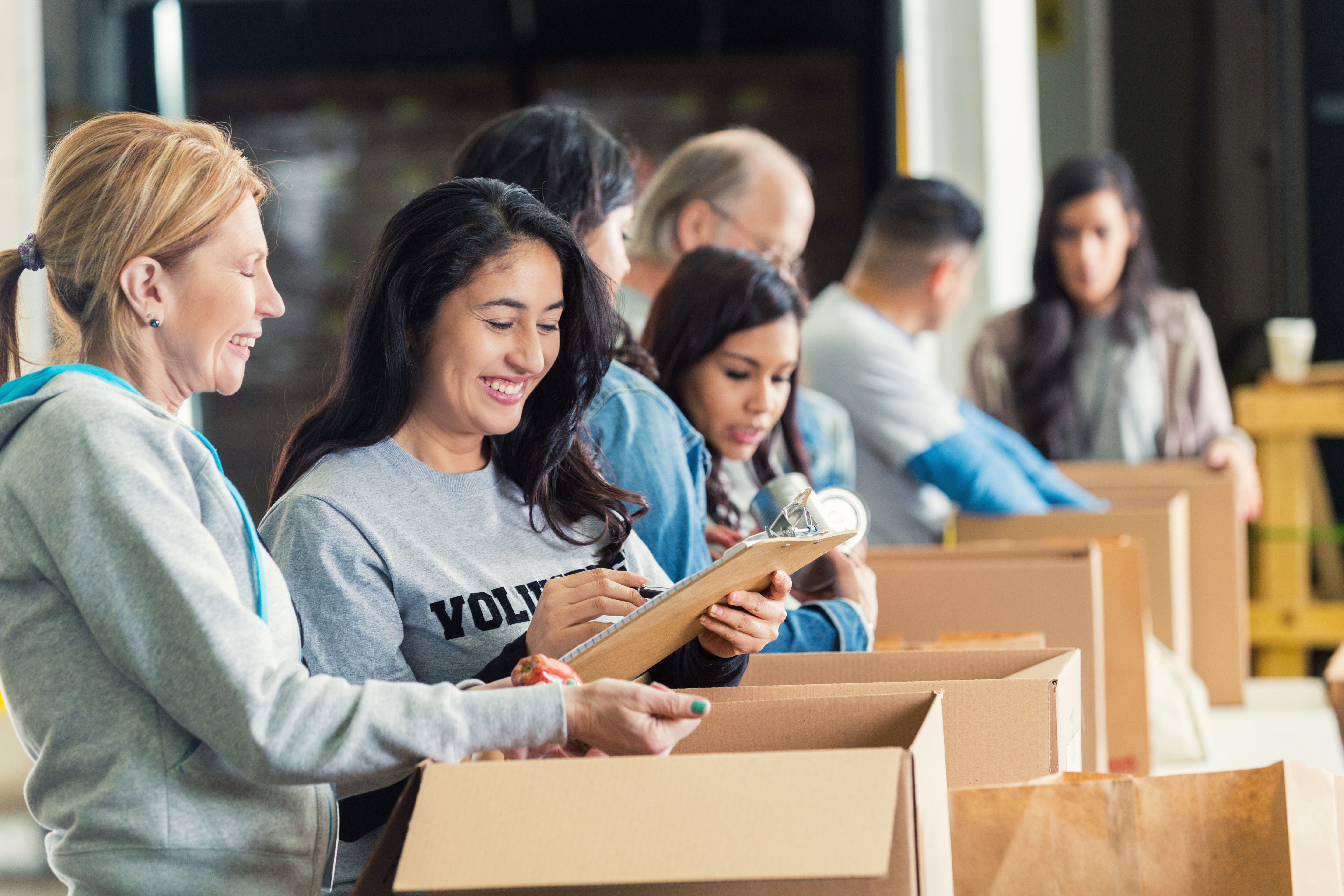 volunteers packing boxes