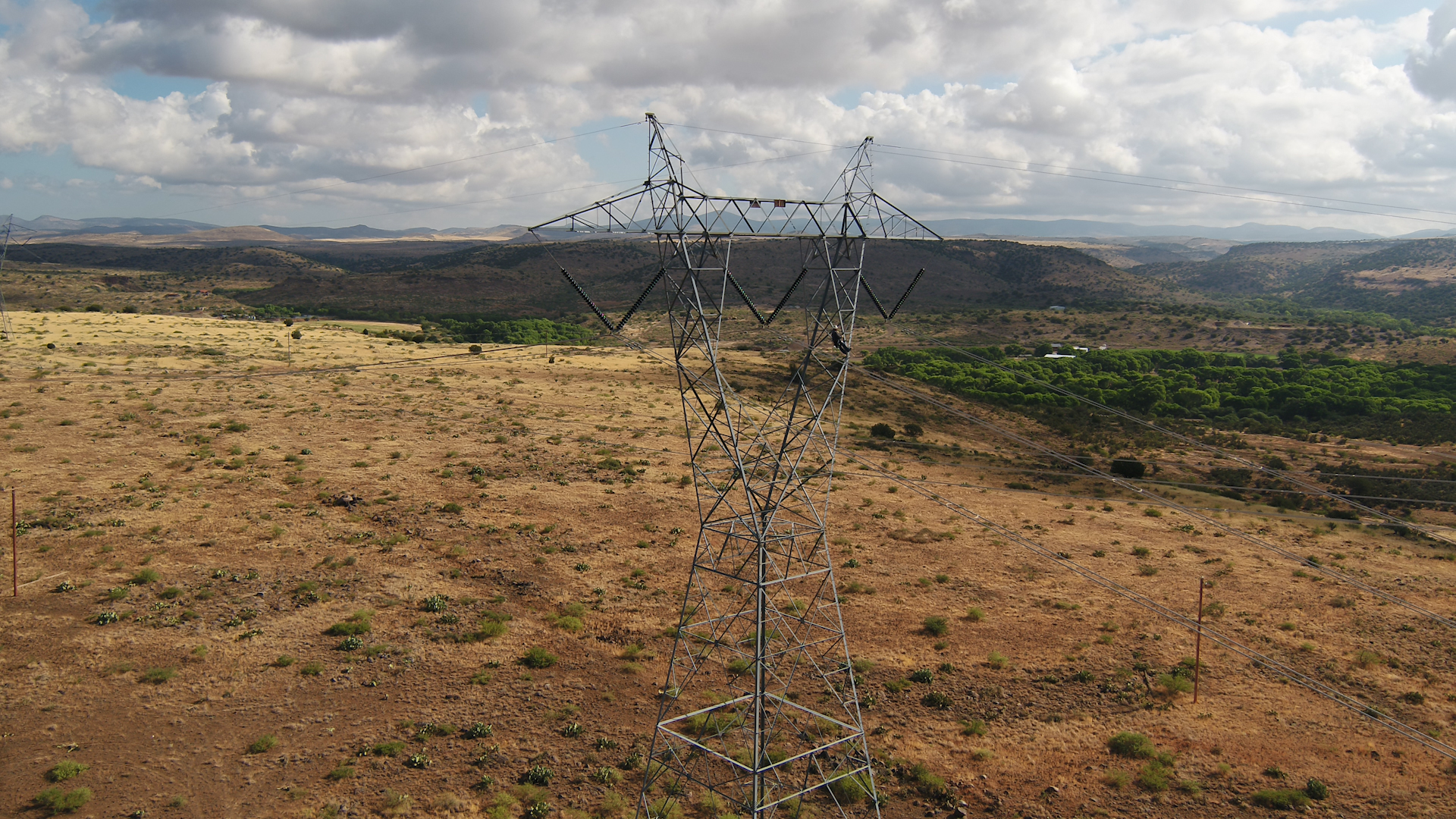 Aerial view of power line in desert