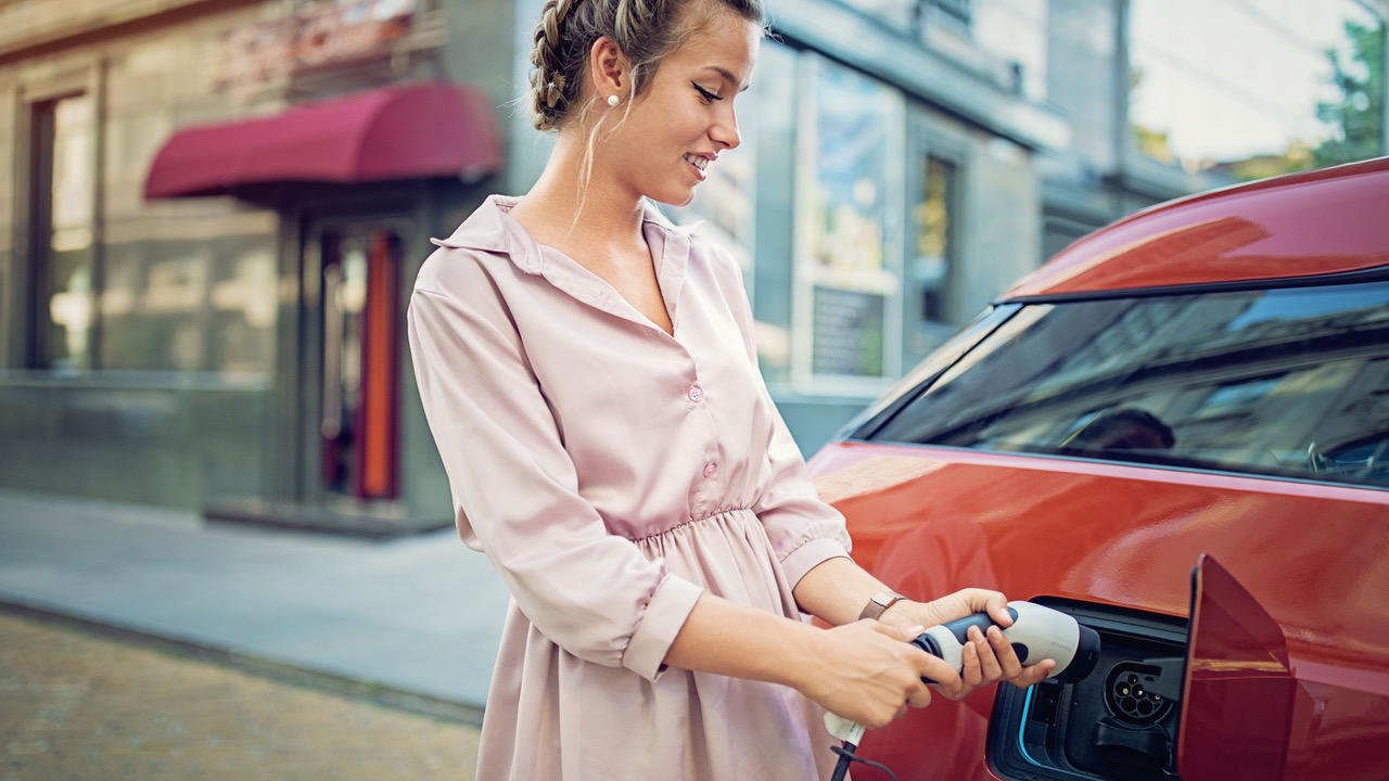 Person using an electric charger.