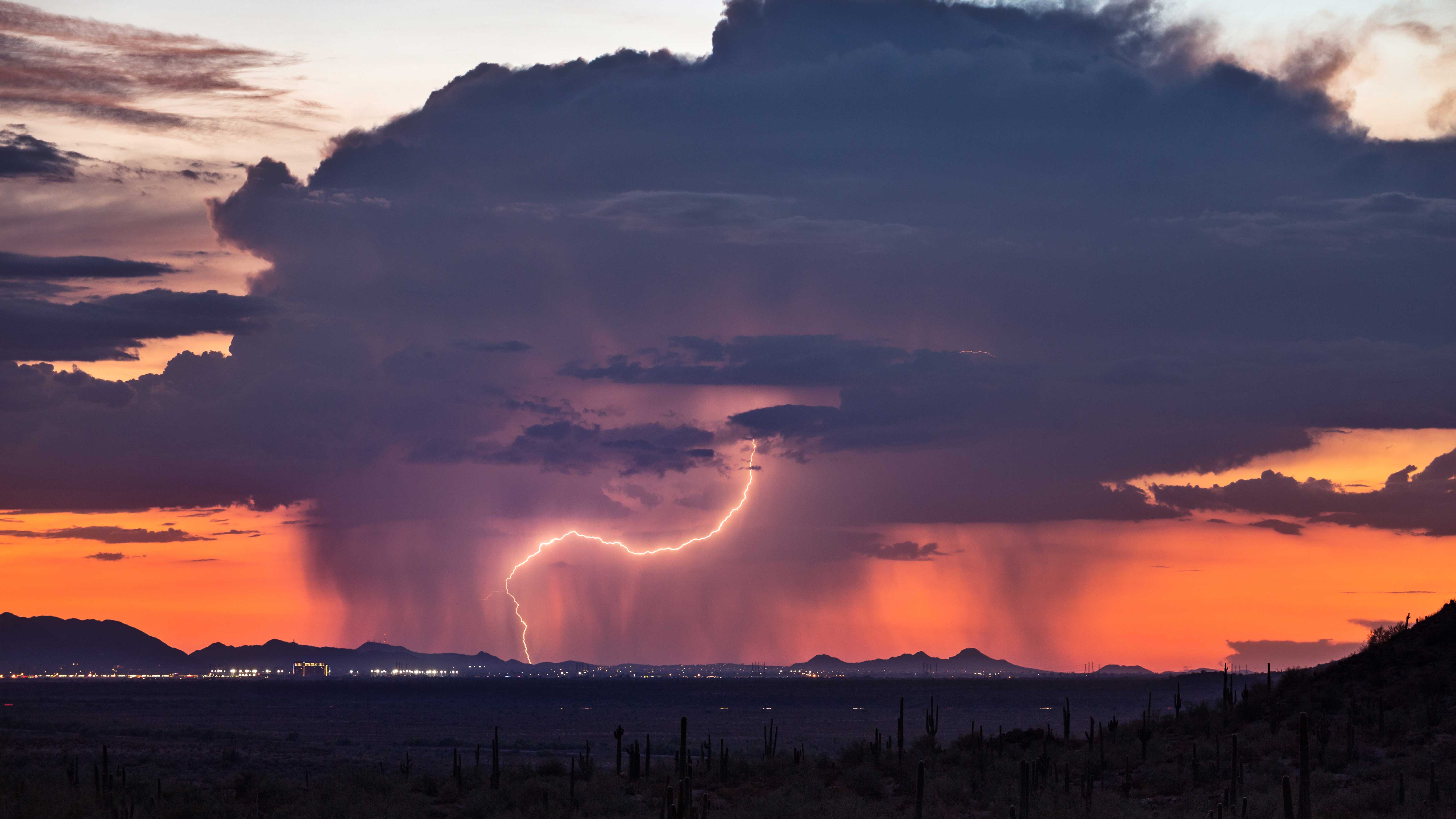 orange stormy sky with lightening