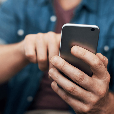 man using cell phone