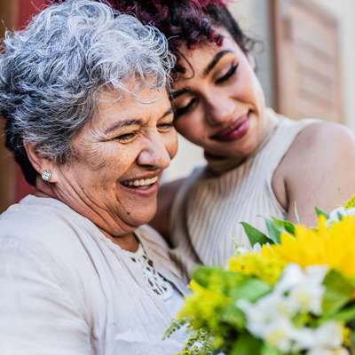 Women looking at flowers