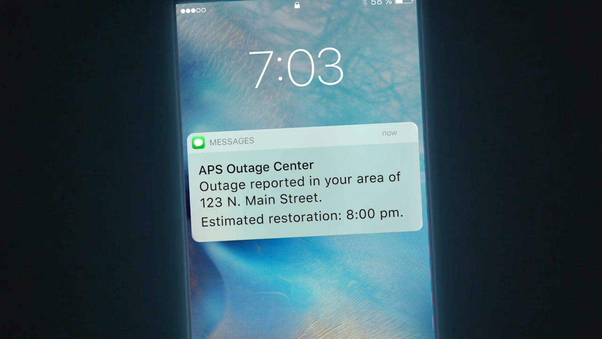 Close up view of an APS Outage Center notification on a phone.