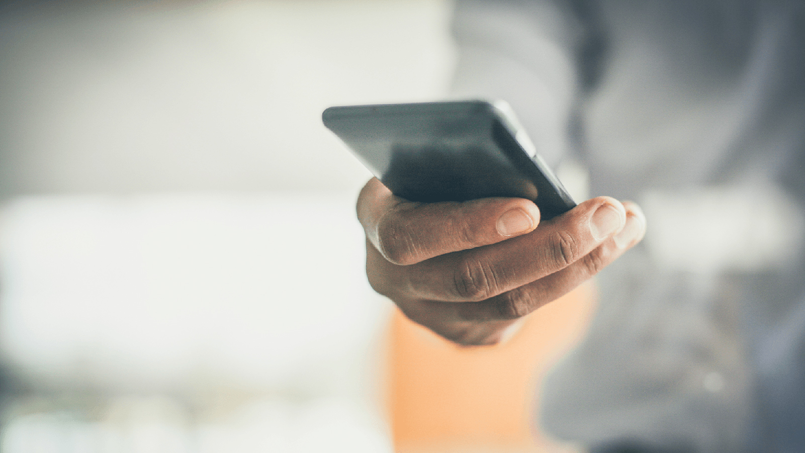 Man using his phone.