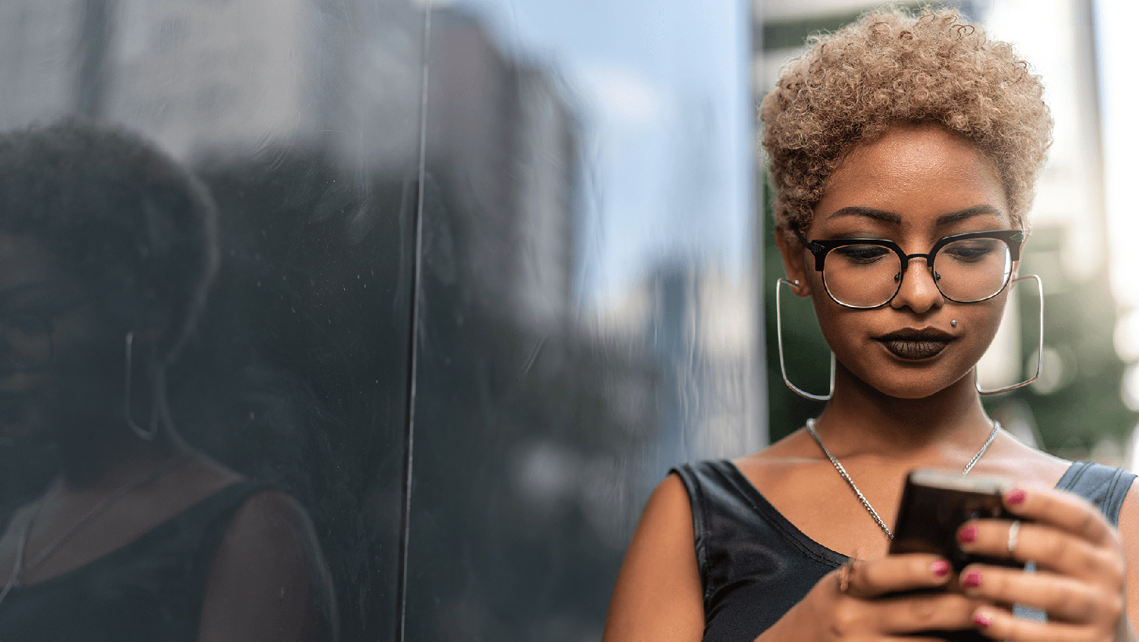 Woman using her phone.