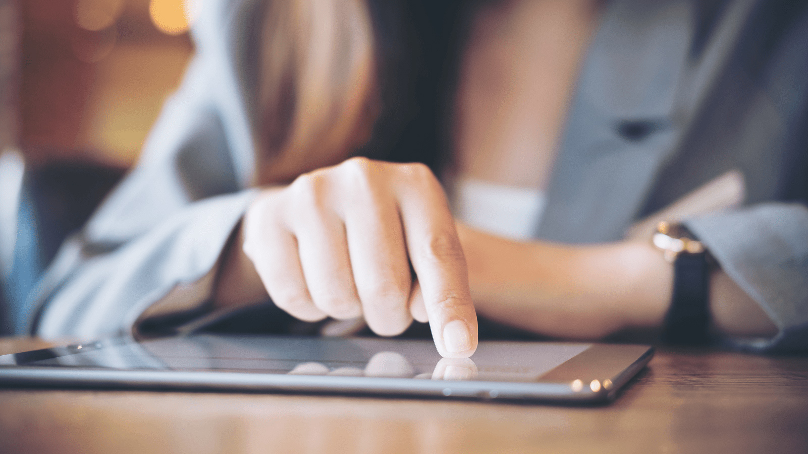 Woman using a tablet.