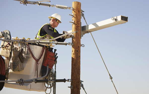APS Linemen in a bucket truck