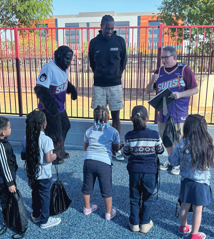 Suns player visits with class