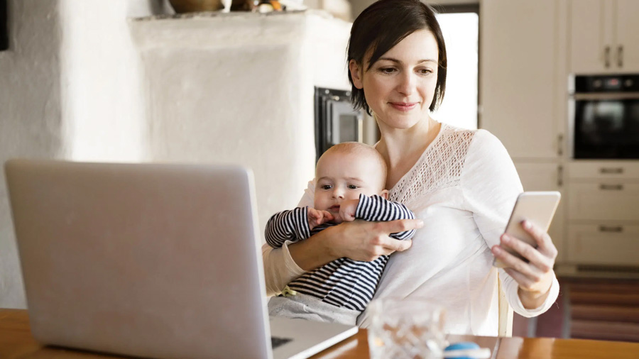 Mom with baby at computer