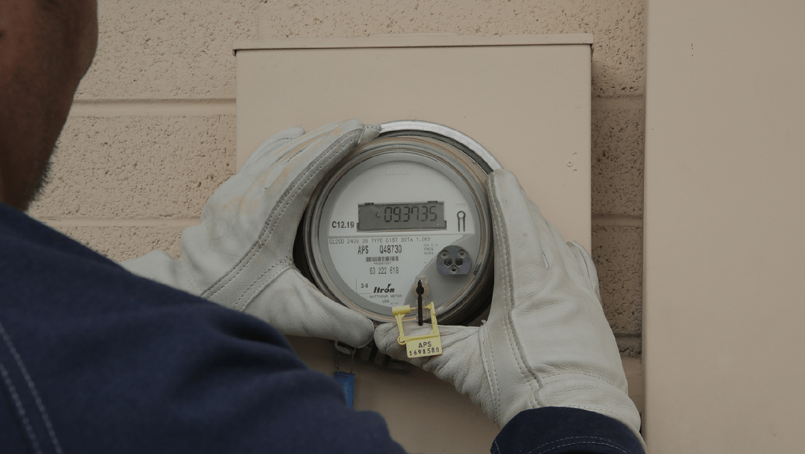 APS employee reading a meter.