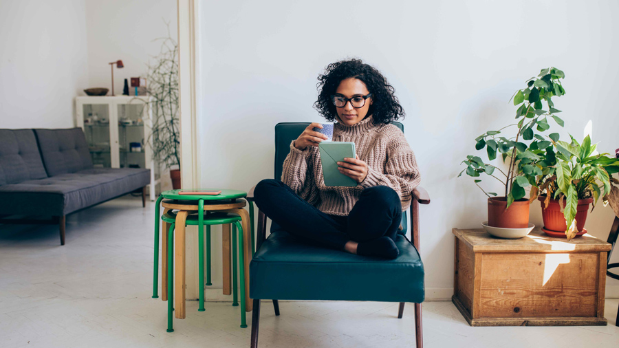 Woman looking at her tablet