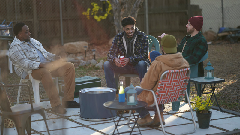 Antonio and his friends in the back yard